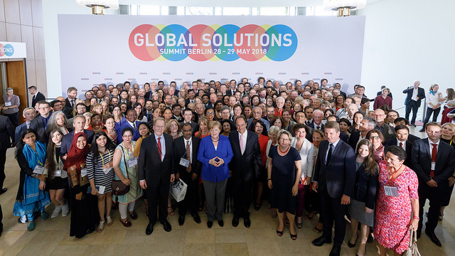 Chancellor Merkel with
                                          speakers